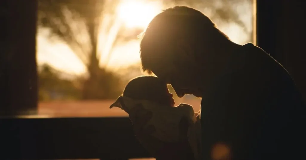 Father's Day Drawing Ideas: New Ways to Celebrate Your Dad 2024 2 Father holding his baby as Father's Day Drawing Ideas