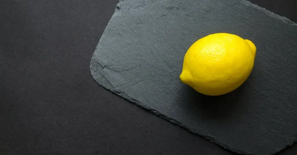 50+ Colored Pencil Drawing Ideas: Spark Your Creativity With These Fun Themes 2024! 5 lemon on black background as Colored Pencil Drawing Ideas
