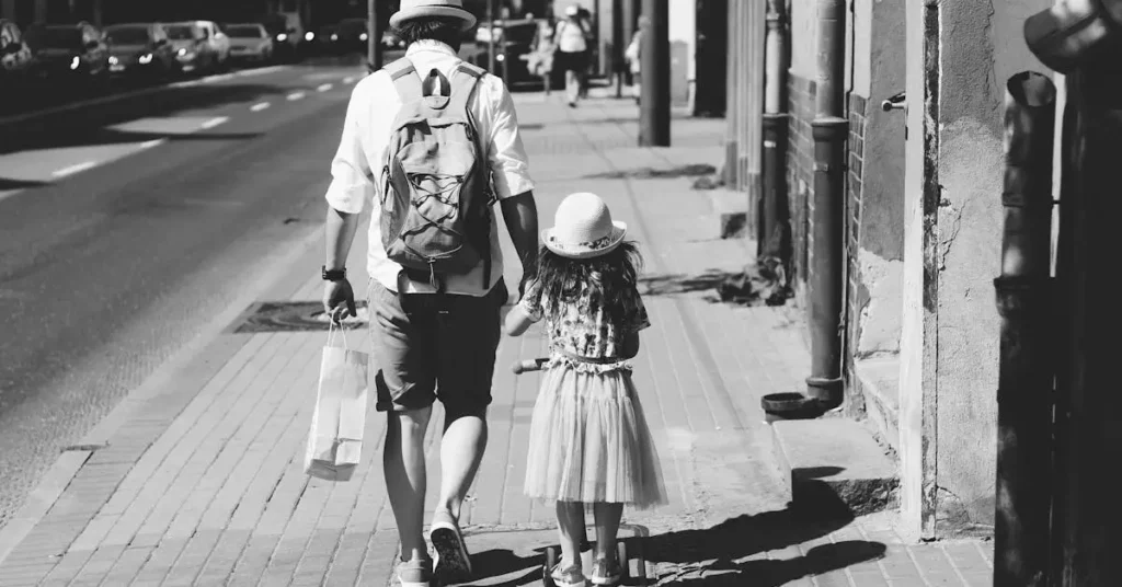 Father's Day Drawing Ideas: New Ways to Celebrate Your Dad 2024 13 father walking with his daughter as Father's Day Drawing Ideas